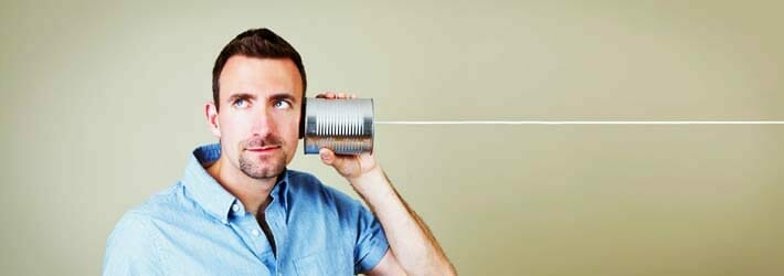 man-talking-on-tin-can-phone.jpeg