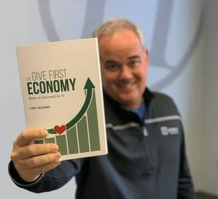 the give first economy kirby hasseman